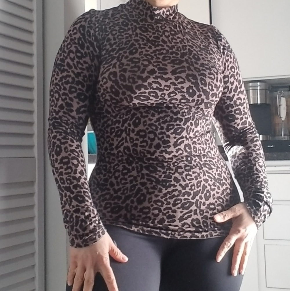 Free people leopard print mock neck, long sleeve, Size M